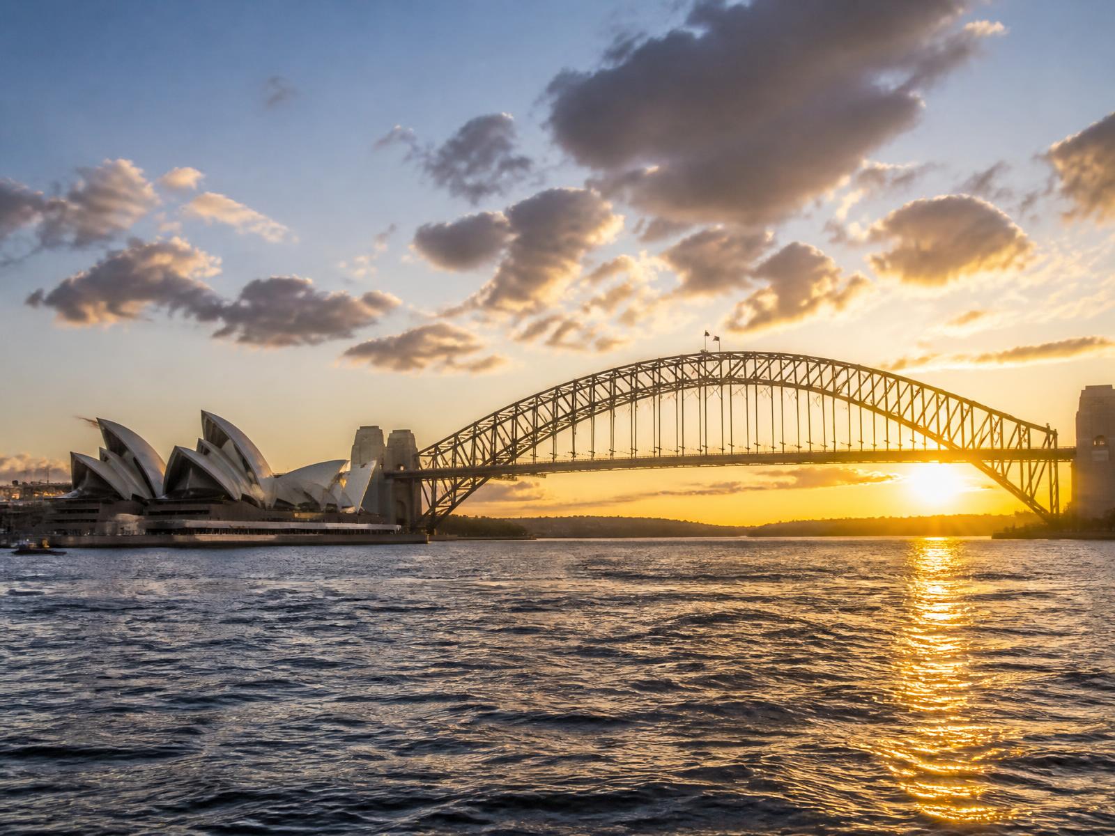 Sydney Opera House and Sydney Harbour Bridge at golden hour